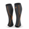 Black and orange compression leg sleeves with graduated support panels