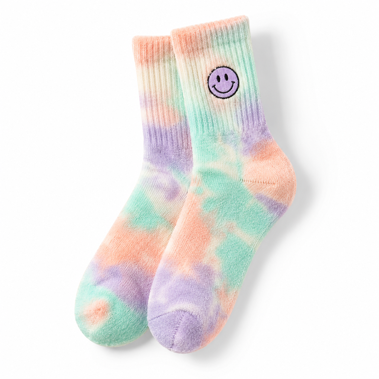 Pastel tie dye crew socks with smiley face motif in mint pink and lilac