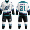 White teal and purple custom ice hockey uniform with snowflake sublimation and number 21