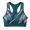 Women's teal and grey sports bra with sublimated abstract print and racerback cut